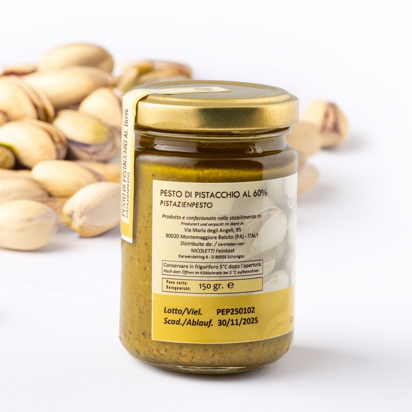 Linke Seite des Pesto di Pistacchio-Glases mit Herstellerhinweis – speziell für Nicoletti Feinkost in Sizilien produziert.