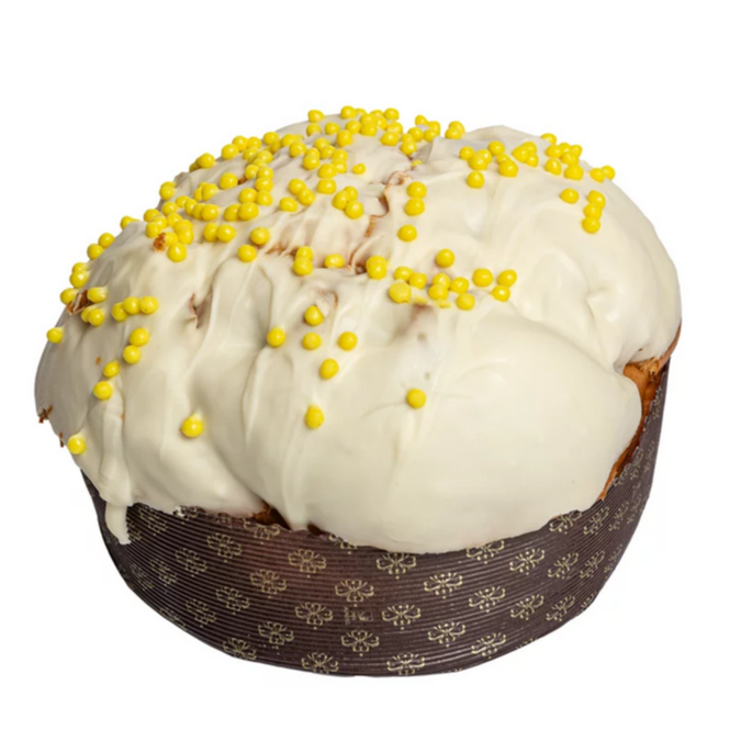 Panettone Agrumi di Sicilia – Saftiger, luftiger Panettone mit einer köstlichen Creme aus sizilianischen Zitrusfrüchten (Orange, Zitrone, Mandarine) und überzogen mit weißer Schokolade. Dekoriert mit Schokoladensphären. Ohne kandierte Früchte. Ein Hauch von Sizilien, direkt zu Ihnen.